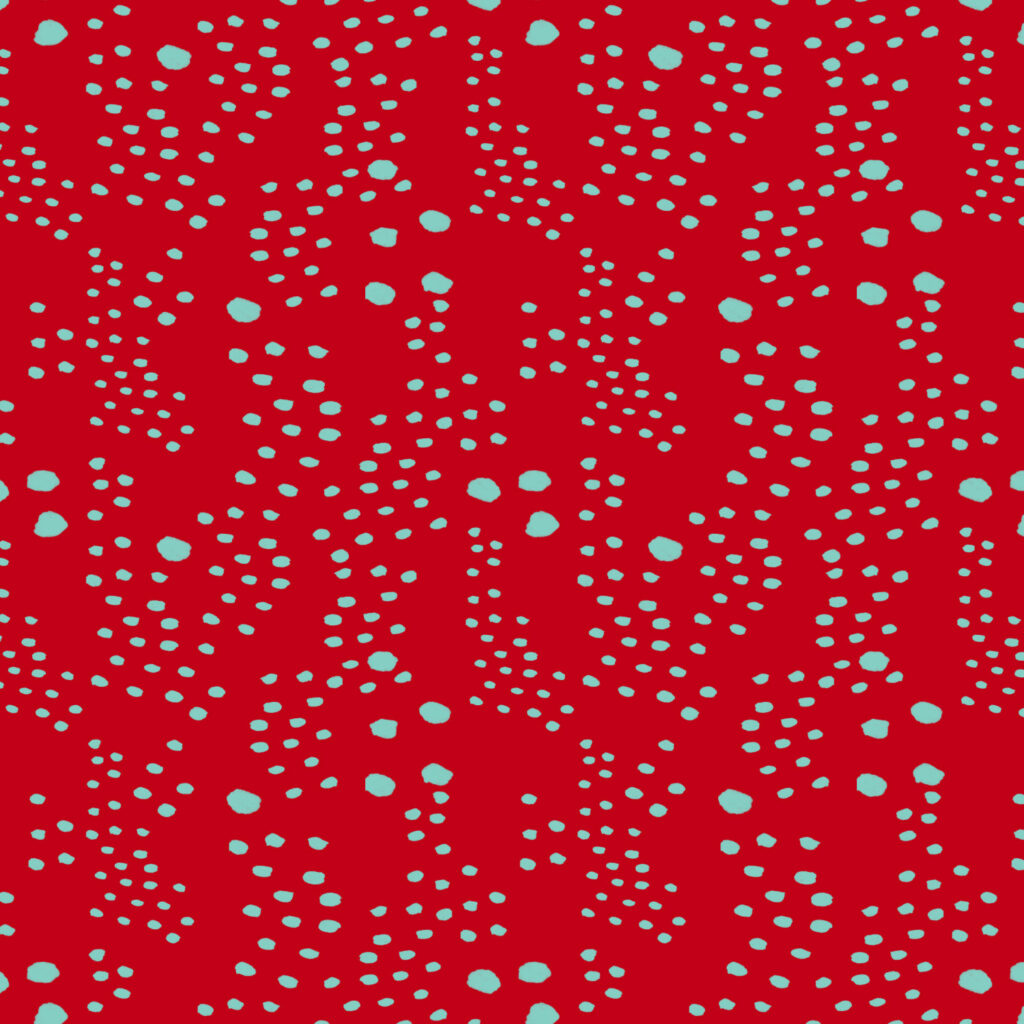 marks in organic shapes on red