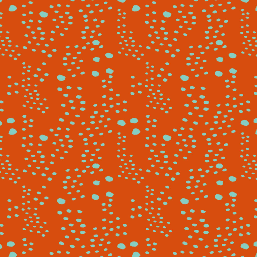 marks in organic shapes on orange