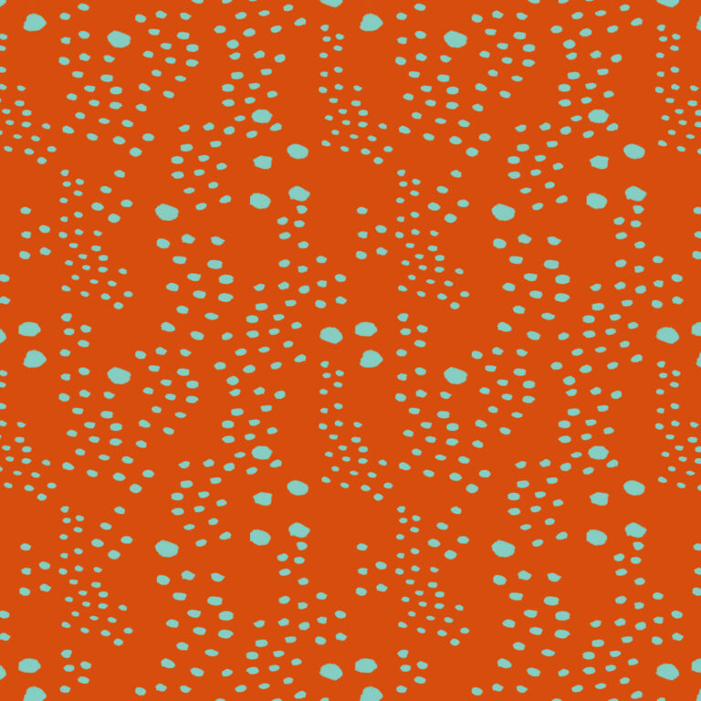marks in organic shapes on orange