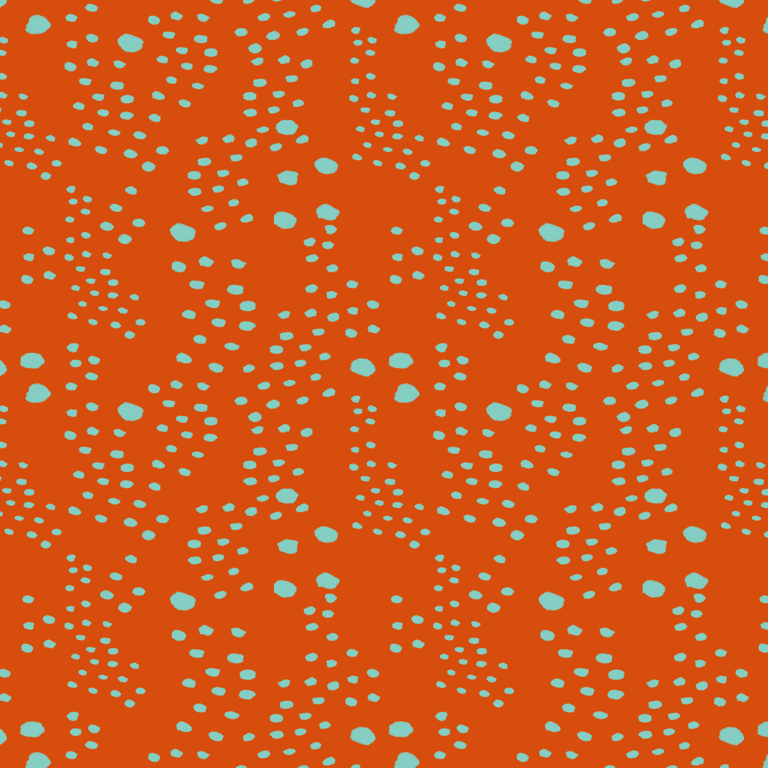 marks in organic shapes on orange