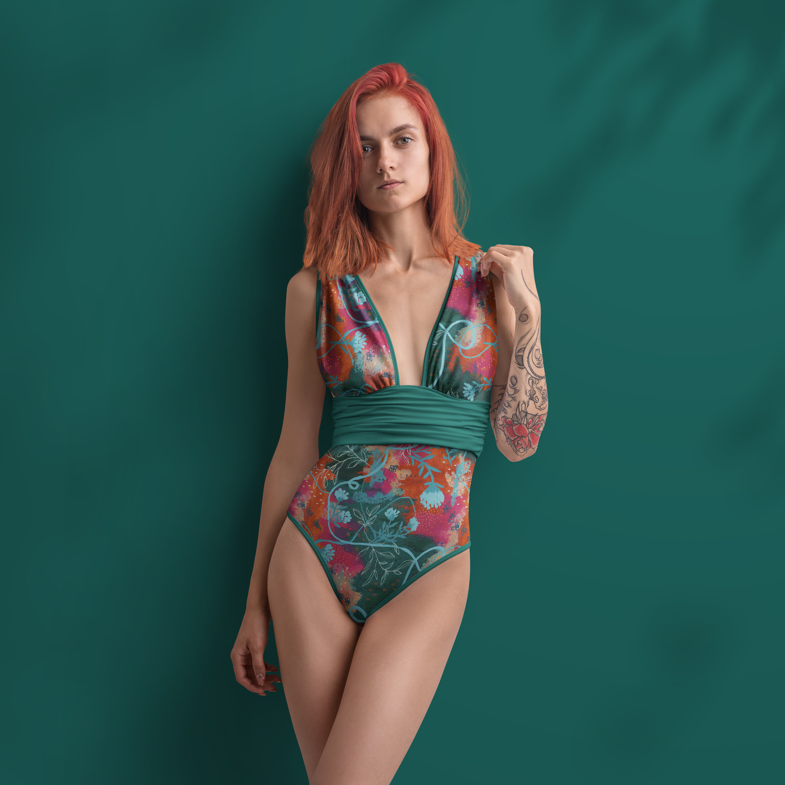 mock up women's one piece bathing suit or swimming costume green orange abstract copa floral